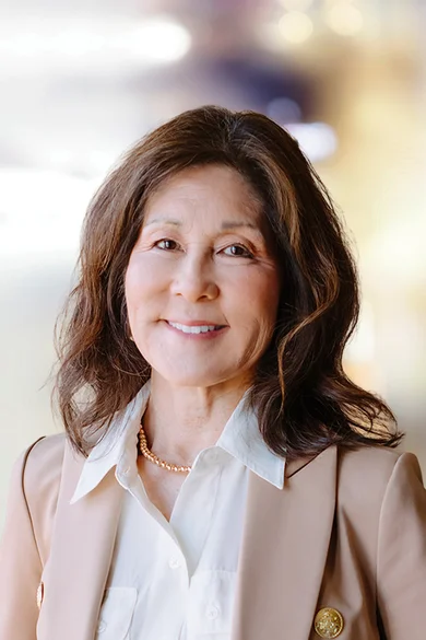 Portrait of Denise Grove, REALTOR® | ABR® | MRP | NRLUX.